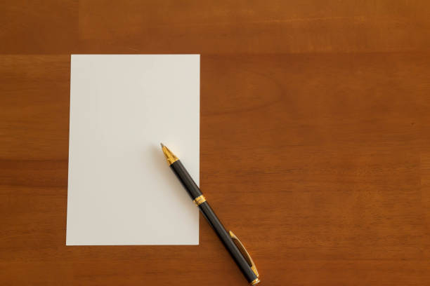istock Postcards and ballpoint pens placed on the table 1344704001