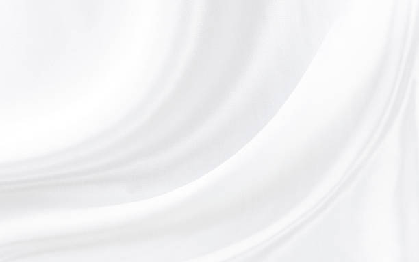 istock White gray satin texture that is white silver fabric silk background with beautiful soft blur pattern natural. 1344705190