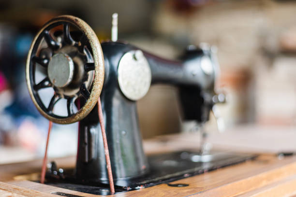 istock Antique vintage sewing machine Side view. 1344705348