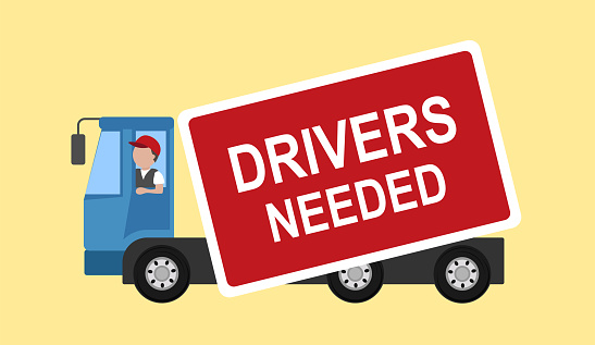 Driver Shortage - Drivers Needed words and trucks logistics business concept.