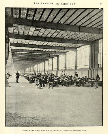 Vintage photograph of the Les Examens de Saint Cyr, Le concours ecrit dans la Galerie des Machines, au Champs de Mars, 1893, 19th Century. French