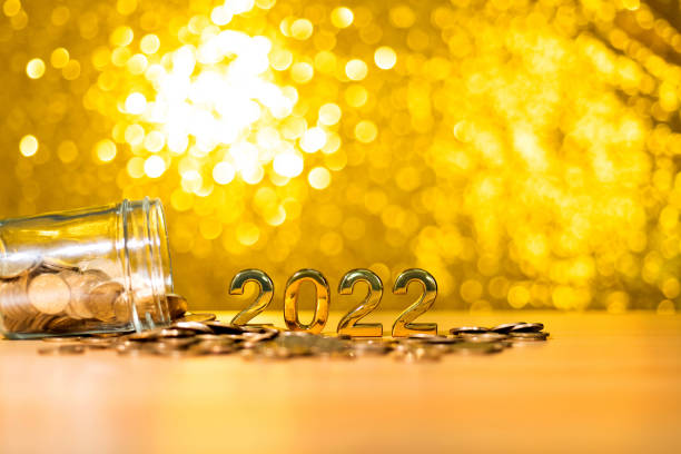 istock 2022 new year and coin jar on the table 1344710969