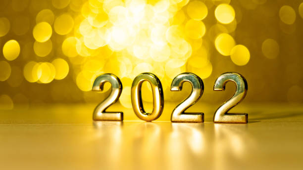 istock Number 2022 on shiny golden background 1344711423