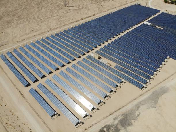 istock Solar panels power station field farm 1344713104