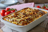 Pasta casserole with bolognese and bechamel sauce and mozzarella cheese topping