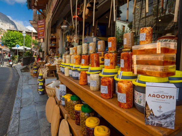 Formaella Greek cheese, produced only in the village of Arachova, and other Greek products in the village store in Parnassus Arahova, Greece. October 2021: Formaella Greek cheese, produced only in the village of Arachova, and other Greek products in the village store in Parnassus arachova greece stock pictures, royalty-free photos & images