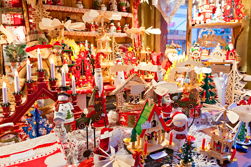Market stall with Christmas tree decorations at the Christmas market in Colmar, France