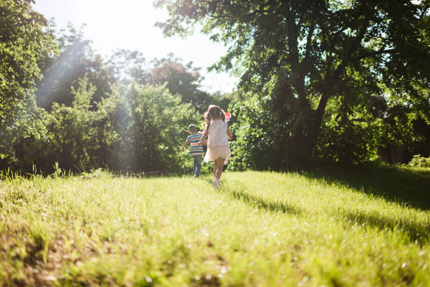 istock Beautiful children running in nature 1344719734