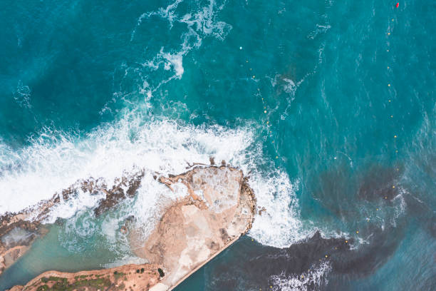 istock Aerial view of waves splashing on beach 1344722745