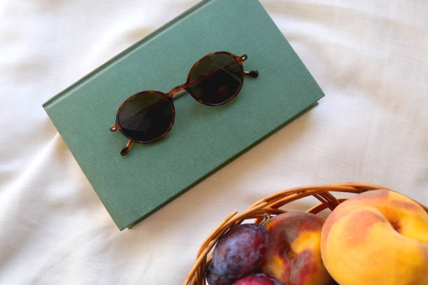 istock Picnic Basket, Book and Sunglasses 1344724452