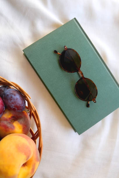 istock Picnic Basket, Book and Sunglasses 1344724454
