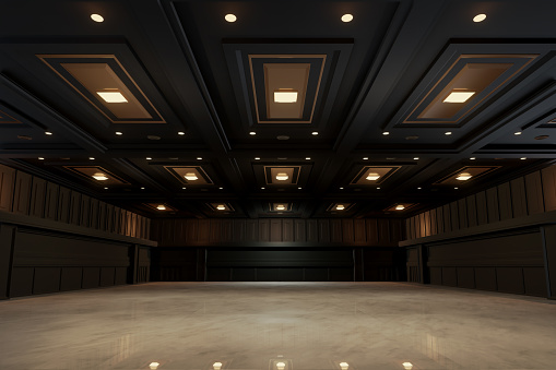Empty convention hall center with stage.The backdrop for exhibition stands,booth elements. Meeting room for the conference.Big Arena for entertainment,concert,event. ballroom.3d render.