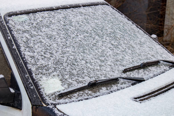 istock Car window covered with snow. After snowfall 1344733496