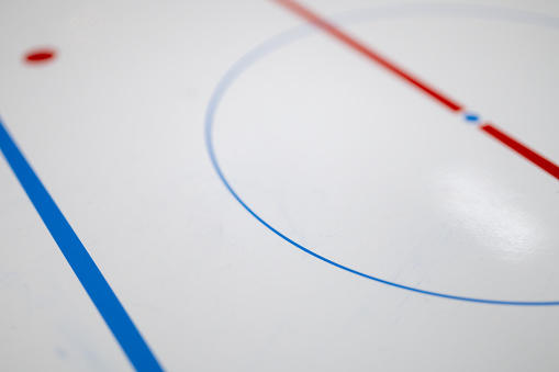 Espoo / Finland - FEBRUARY 2, 2020: Selective focus closeup of an ice hockey analytics chart with the faceoff point, and the blue line
