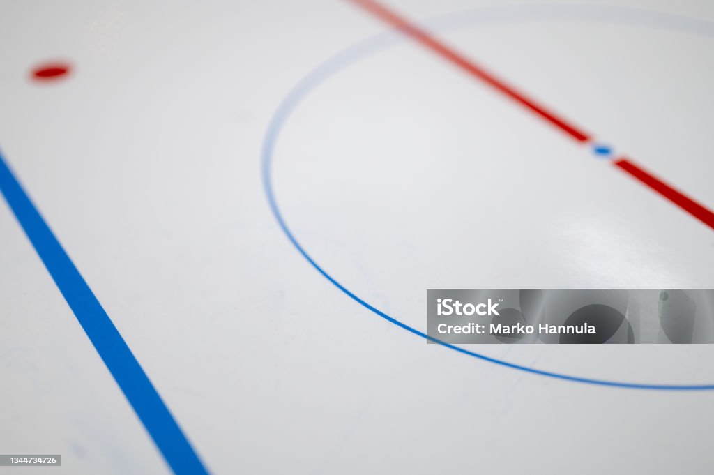 Selective focus closeup of an ice hockey analytics chart with the faceoff point, and the blue line Espoo / Finland - FEBRUARY 2, 2020: Selective focus closeup of an ice hockey analytics chart with the faceoff point, and the blue line Ice Hockey Rink Stock Photo