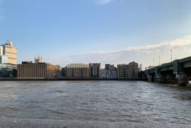 istock Waterfront along Thames River on a Sunny Day 1344735096