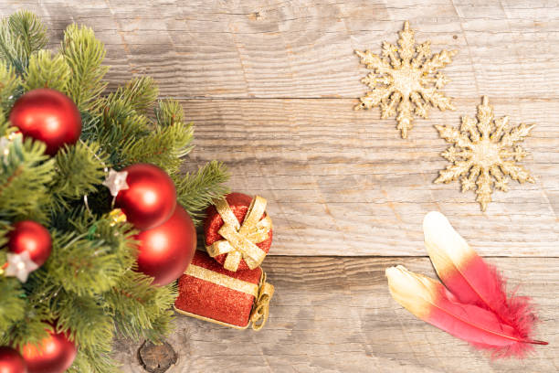 istock Christmas ornaments on rustic wooden background 1344740617