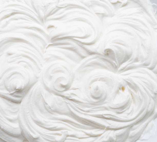 istock Creamy pics in yoghurt or cream surface. Top view. 1344743963
