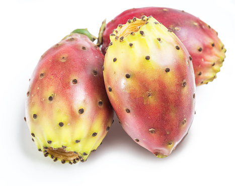 Opuntia fruit or prickly pear fruit on white background. Close-up.