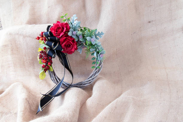istock gorgeous red roses and rose hip wreath 1344746692