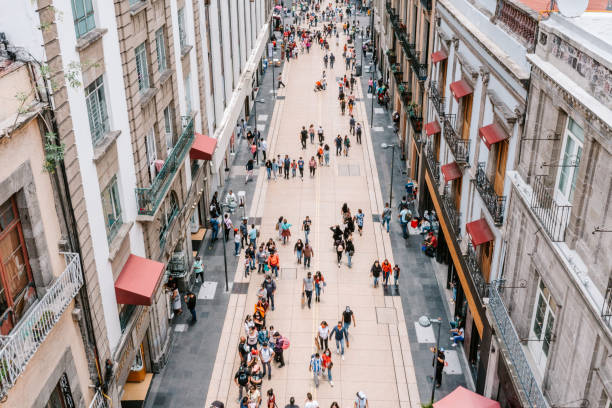 Aerial view of a crowd in Mexico city Aerial view of a crowd in Mexico city high street stock pictures, royalty-free photos & images