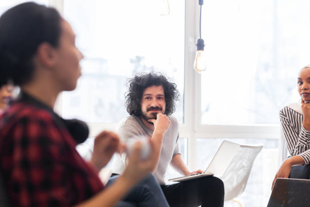 istock Young successful people brainstorming at a creative meeting. 1344747925