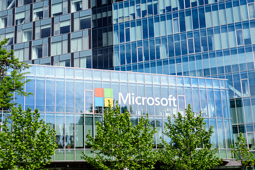 Bucharest, Romania - 15 May 2021: Microsoft headquarter and offices in City Gate Towers in the Northern part of the city in a sunny spring day