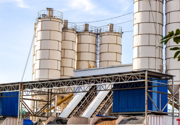 istock Heavy concrete manufacturing factory under the clean blue sky 1344752119