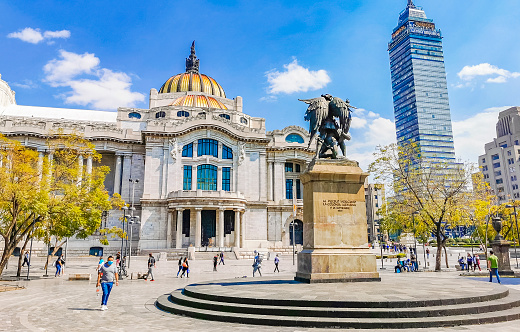 Mexico City Mexico 09. February 2021 The palace of fine arts and the Torre Latinoamericana skyscraper in the Alameda Central park Mexico City in Mexico.