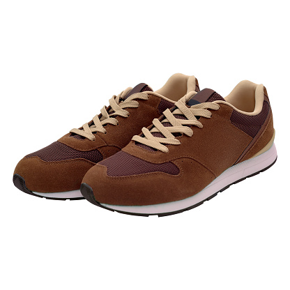 Pair of brown sport shoes on isolated on white background with clipping path. Blank new sneakers, copy space. Male shoes
