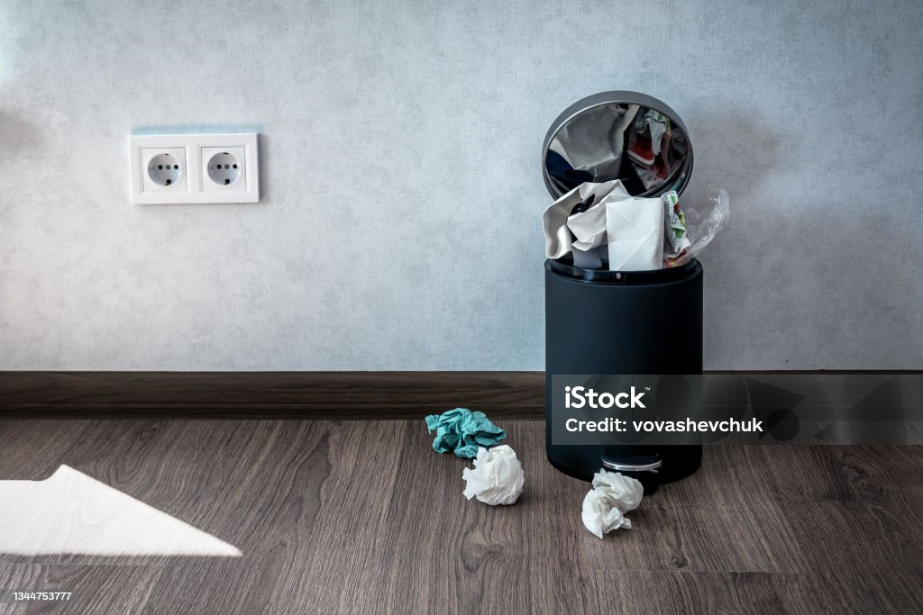 trash can full of paper black trash can full of paper garbage Garbage Can Stock Photo