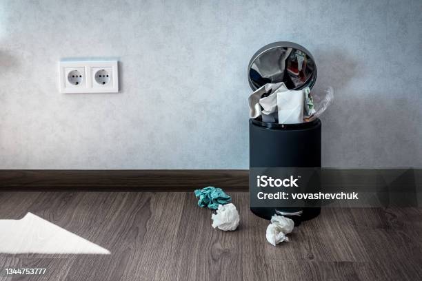 Trash Can Full Of Paper Stock Photo - Download Image Now - Garbage Can, Garbage, Wastepaper Basket