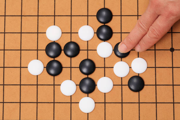 istock chinese game go,  Gobang and go game board 1344755560