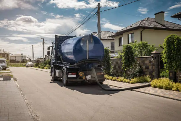 Sewage Tank truck. Sewer pumping machine. Blue Septic truck