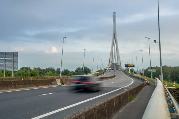 istock Vehicles passing by the Normandy bridge 1344757445