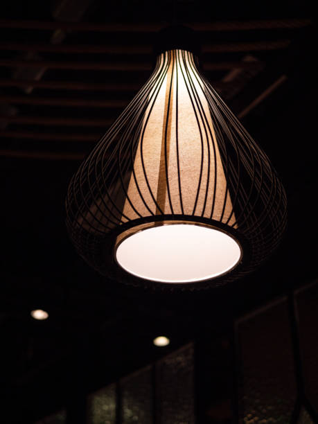 istock Lamp Head and Holder on Dark Background 1344759548