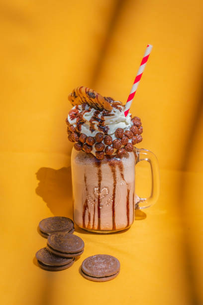 istock Mason jar milkshake with chocolate, cake. 1344761199