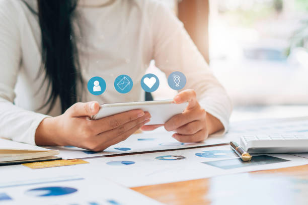 istock Close-up image of woman hands using smartphone and social network concept. 1344762557