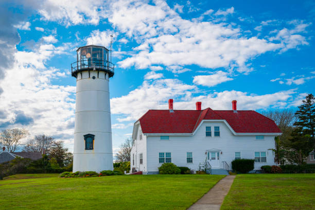 istock Tranquil cloudscape and landscape over the Chatham Light in Chatham, Massachusetts 1344763474