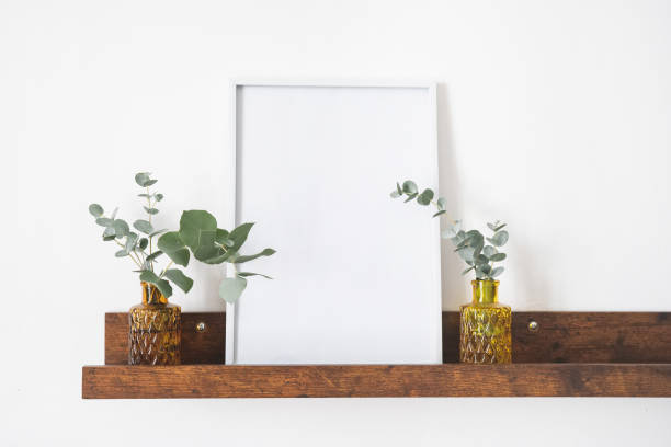 istock Image of mock up scene with white picture frame 1344764858