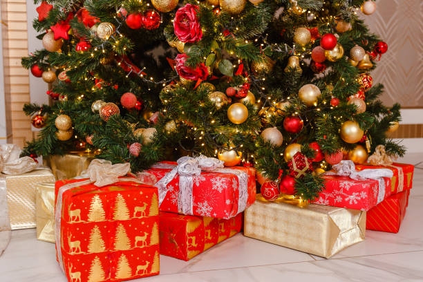 istock beautiful big elegant Christmas tree with red balls. holiday 1344765315