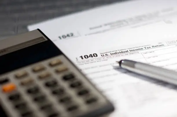 Photo of Tax Season: 1040 U.S. Individual Income Tax Return Form