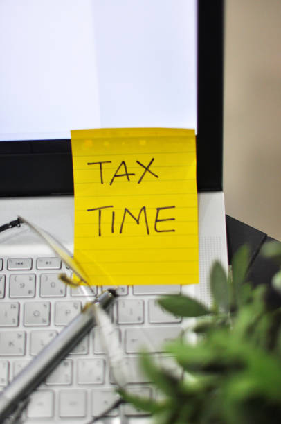 istock Tax Season: 1040 U.S. Individual Income Tax Return Form 1344766733