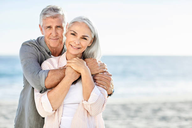 istock Mature couple at beach during vacation 1344767713