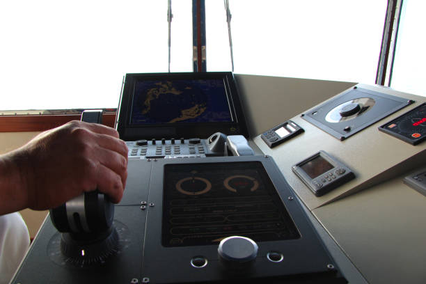 Shipmaster at the ship's wheel, ship's control room, Turkey stock photo