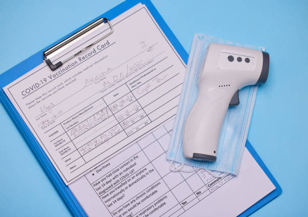istock Studio shot of a thermometer and clipboard against a blue background 1344772306
