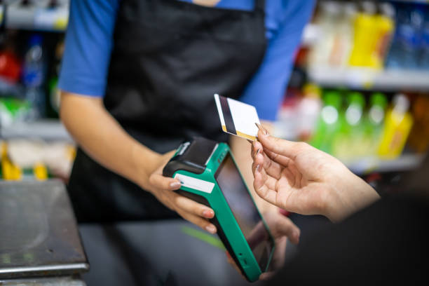 istock Make contactless payments with a credit card at the store 1344775566