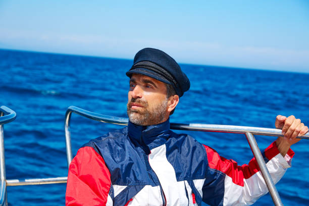 istock Beard sailor cap man sailing sea ocean in a boat 1344779846