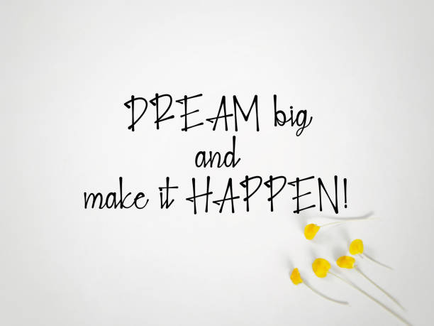 Dream big and make it happen text background. Stock photo.
