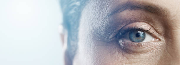 close-up of female eye. rejuvenation or ophthalmology concepts. - visão imagens e fotografias de stock